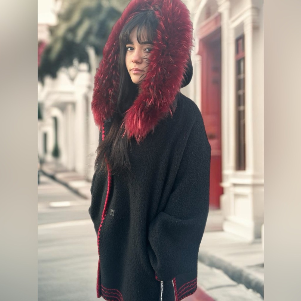Italian alpaca dyed black & dyed red fox trim around hood of coat. Handcrafted